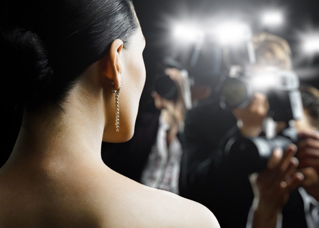 Woman having her picture taken on red carpet also struggles with celebrity eating disorders