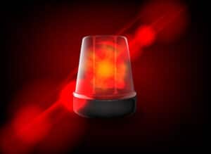A red emergency light flashing.
